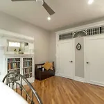 A Charming 4 Bd Garden Oasis Brick Townhouse