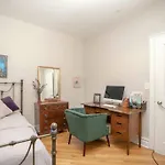 A Charming 4 Bd Garden Oasis Brick Townhouse