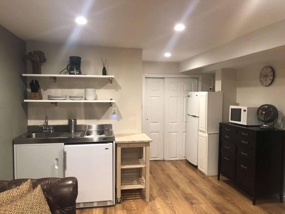 A Charming 4 Bd Garden Oasis Brick Townhouse