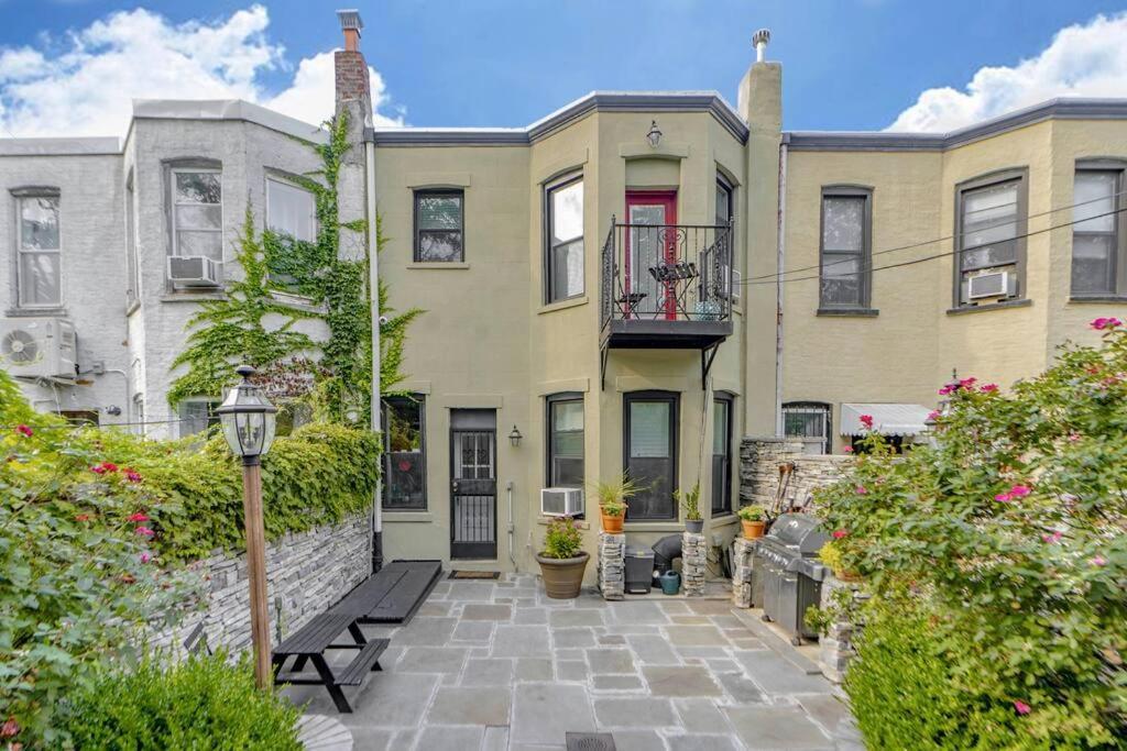 A Charming 4 Bd Garden Oasis Brick Townhouse