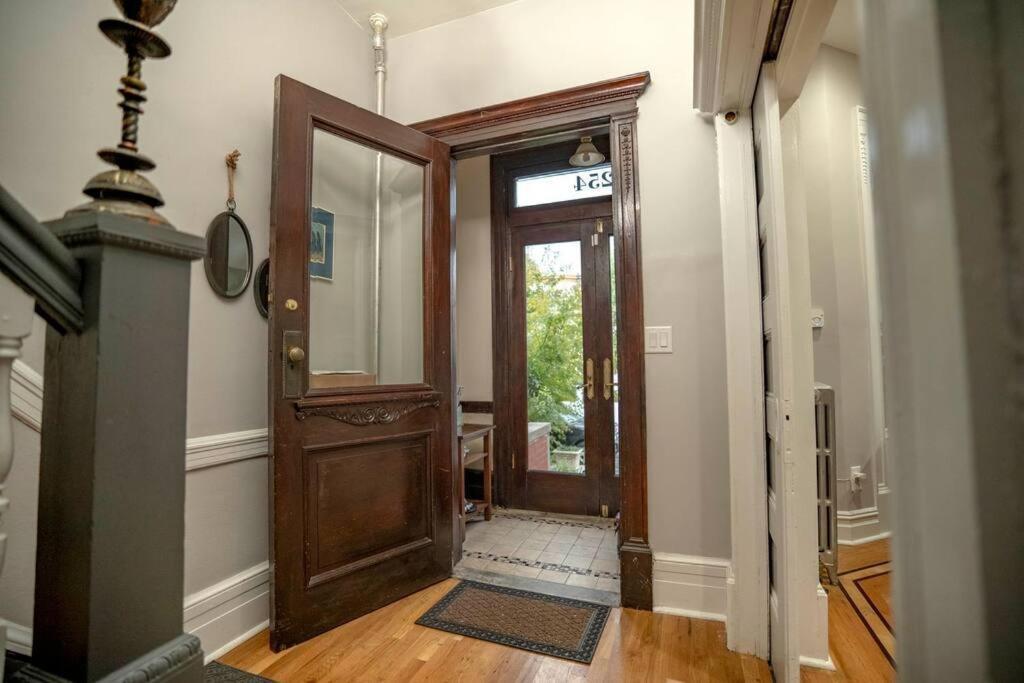 A Charming 4 Bd Garden Oasis Brick Townhouse Apartment